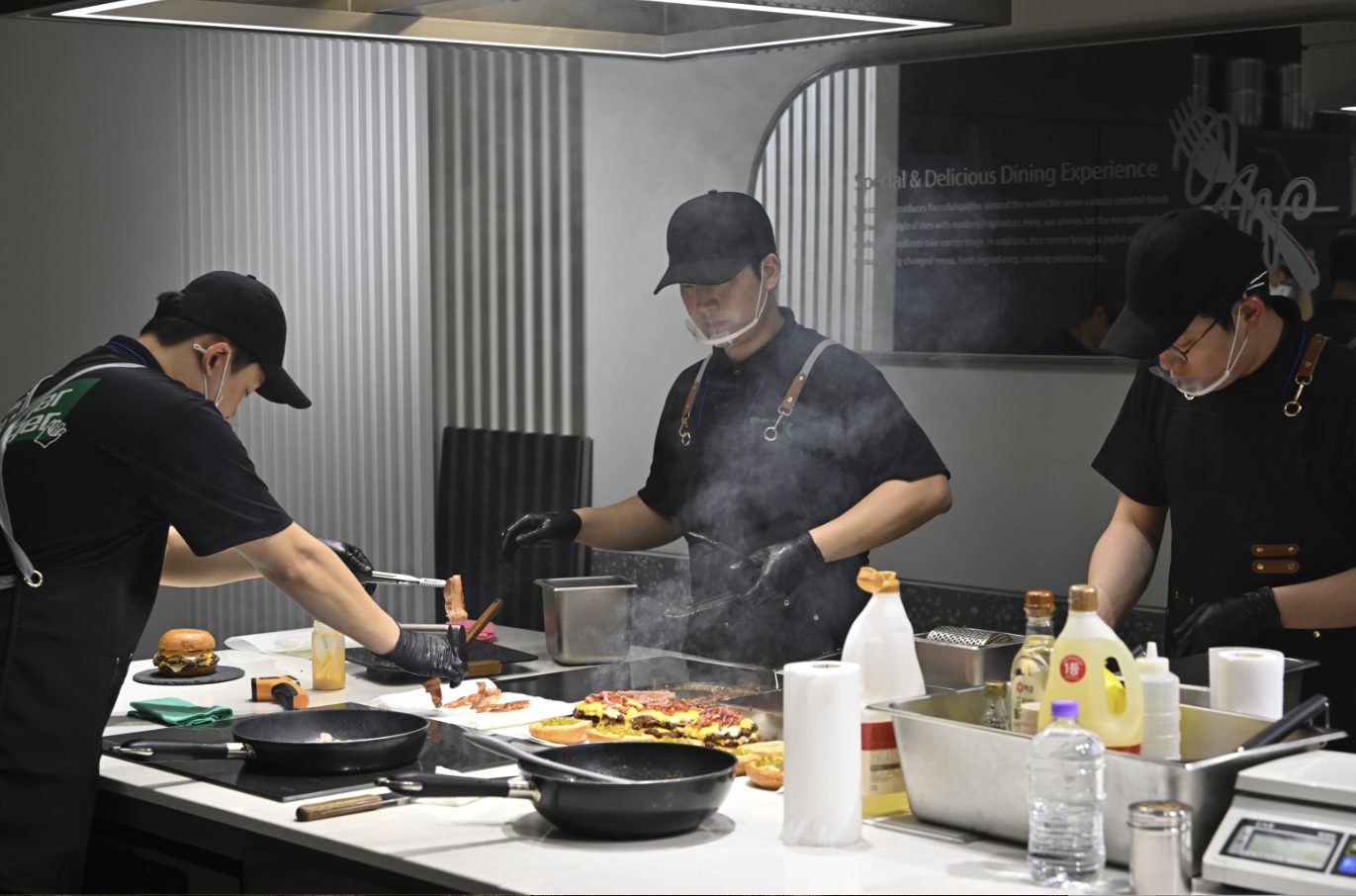 Teams cooking at the competition